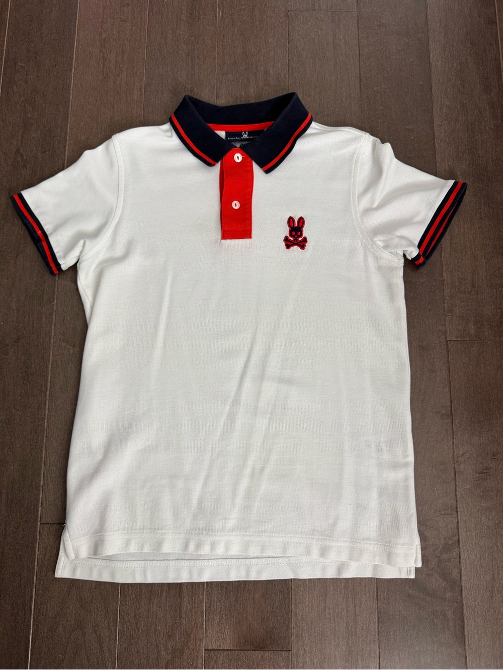 Psycho Bunny White Polo with Red Placket & Navy Trim (size 2, XXS)